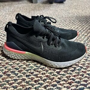 Nike Women's Black Athletic Shoes with Pink Accent